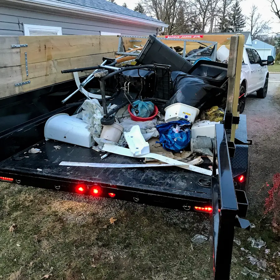 Roll-off dumpster delivered to a residential driveway in Mount Dora